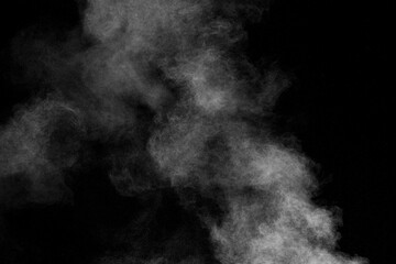 White dust cloud in the air.Abstract white powder explosion against black background.