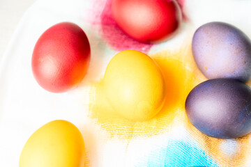 Painted eggs on the table after painting, a symbol of Easter, eggs 