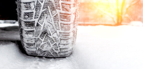 winter tires on snow and mud on the wheel