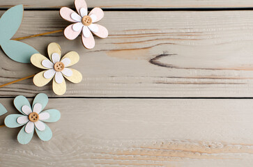 Wood crafts on the table. DIY flowers