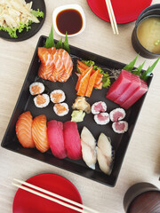 Closeup of fresh sushi on ceramic dish, Japanese food