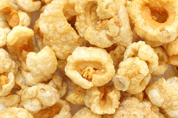 Pork rinds or Pork snack, deep fried pork skin crispy and blistered, Thailand food.