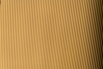 gold color background with stripes