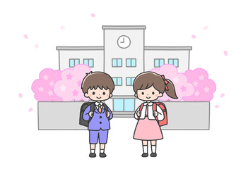 入学式　校門の前に立つ新一年生の男の子と女の子