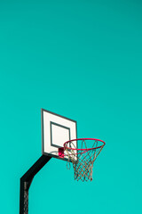 Street basketball hoop on background of vibrant sky. Creative minimalistic photo. Street Basketball Loop Basket Outdoors Abstract sport wide blank empty background texture, copy space. Sports, leisure
