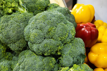 Close up of various colorful raw vegetables like red yellow capsicum or bell paper  and broccoli 