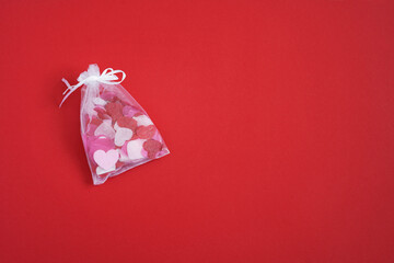 Valentine's Day  red background with  red hearts.  Love and relationships concept. Copy space