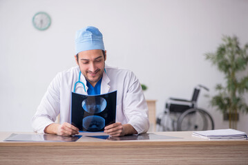 Young male doctor radiologist working in the clinic