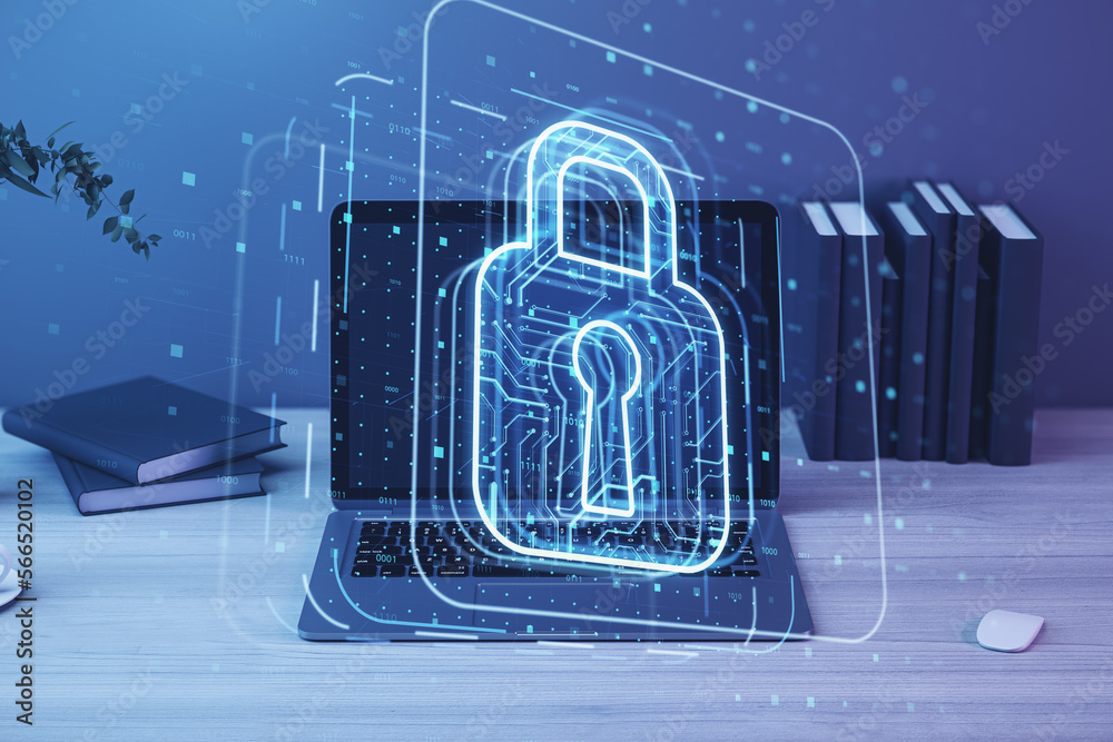 Poster close up of laptop on desktop with books and glowing padlock hologram on blurry background. secure, 