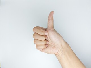 Close up hand male showing thumb up, ok, all right, victory hand sign gesture. Gestures and signs. Body language on white background