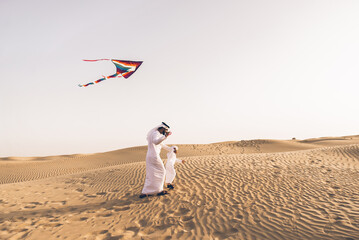 father and son spending time in the desert