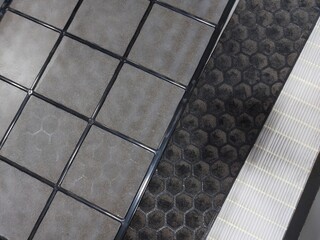 Close-up on dirty Air Purifier Filter component : Pre Filter, Carbon Filter, and HEPA filter to...