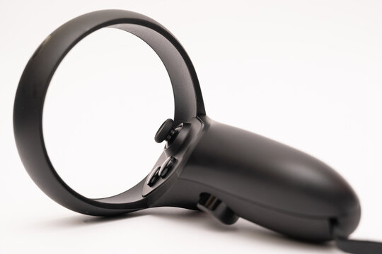 oculus rift touch controller isolated on white background. virtual reality wireless system created by Oculus VR, division of Facebook.