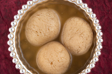 Indian Mithai Gurer Rosogolla Also Called Rasgulla, Rasagola, Rosgola, Roshogolla, Rossogolla, Rasbhari Or Rasbari Is Ball Shaped Dumpling Made Of Chhena, Sugar Syrup, Gud, Chena, Panir, Paneer, Gur