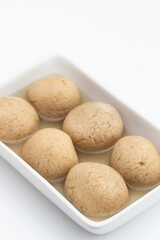 Indian Mithai Gurer Rosogolla Also Called Rasgulla, Rasagola, Rosgola, Roshogolla, Rossogolla, Rasbhari Or Rasbari Is Ball Shaped Dumpling Made Of Chhena, Sugar Syrup, Gud, Chena, Panir, Paneer, Gur