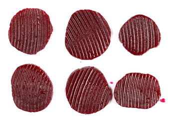 Set fresh cooked beetroot slice and drops isolated on white, top view