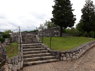 An traditional Mediterranean staircase on a cloudy day