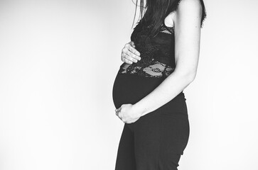 Pregnant woman in black dress