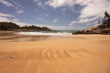 Water and patterns on beach at Florence Bay on Magnetic Island