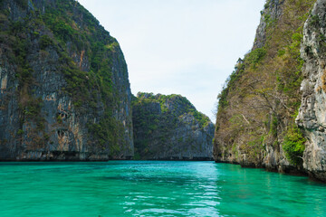 Fototapeta na wymiar Sea lagoon and green rock in Thailand. Traveling and vacation concept.