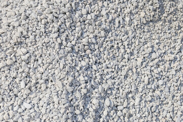Seamless texture of white stones or gravel