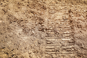 Track wheels track on dirt soil or Track on ground.