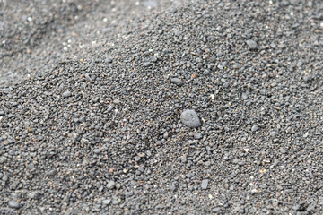 Detail of the gravel arising from the volcanic rock eroded by the sea at Playa de las Malvas in Lanzarote