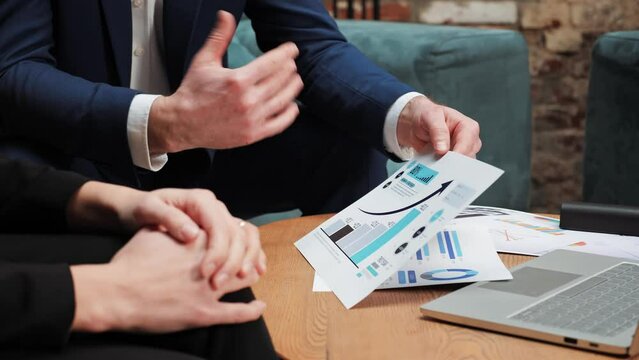 Close-up hands business people meeting plan analysis statistics brainstorm and header of team hold tablet pointing graph chart and employee take note. Finance strategy statistics success concept.