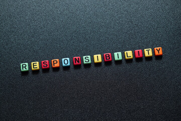 Responsibility - word concept on cubes