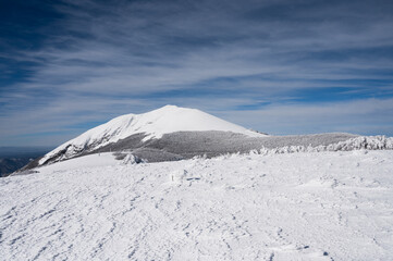 Italy, January 2023 - beautiful winter landscape on mount Catria after a heavy snowfall and frost. It expresses well the concept of peace, silence and freedom in nature