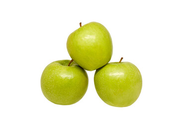 three ripe green apples stacked in a pyramid