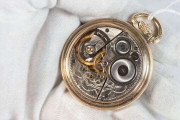 Engineered Antique Mechanical Pocket Watch Movement Side In Hand