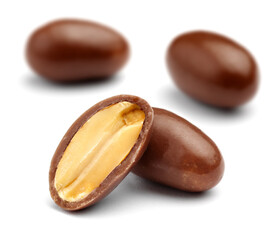 chocolate covered peanuts isolated - 566558116