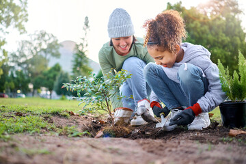 Volunteer, child and woman with plant for gardening in park with trees in nature environment. Happy...