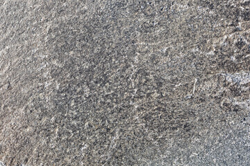 Natural stone texture. Rough granite rock surface textured background