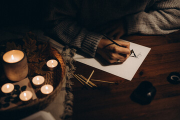 calligraphy person is writing a note hand writing 

