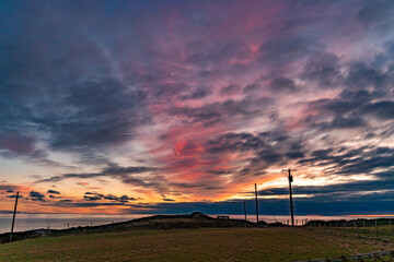 Obraz premium sunset at south stack lighthouse isle of Anglesey