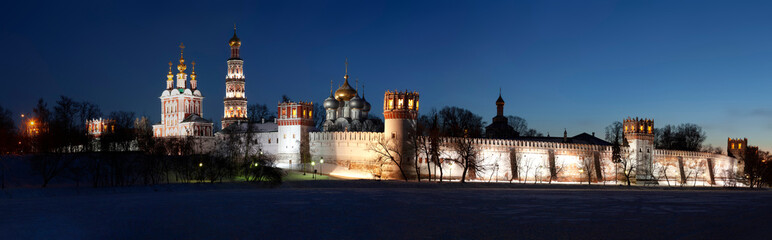 Fototapeta na wymiar Panorama of the Novodevichy Orthodox Convent on a winter evening. Moscow, Russia