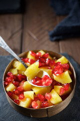 Pineapple chunks and pomegranate seeds