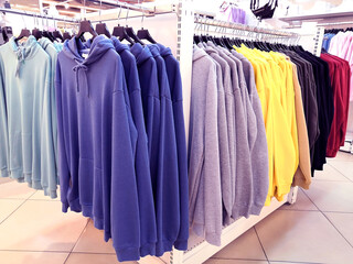 Men's clothing trading floor, designer fashion sweatshirts, sale.