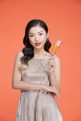 Beautiful woman shiny dress hold glass of champagne