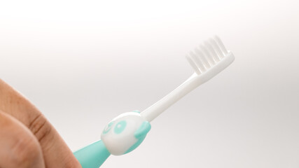 Toothbrush of baby health care. Toothbrush for young baby. children's dental equipment. children teeth brush. Perfect and healthy teeth concept