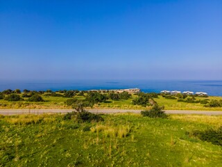 Fototapeta na wymiar Sea view lands in green field in Esentepe, North Cyprus