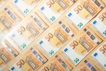 Fototapeta na wymiar billetes de 50 euros ordenados