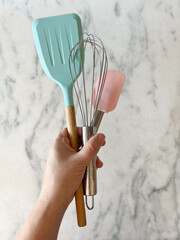 kitchen utensils, tools and equipment on a marbel background