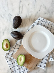 Fresh cut avocado on a marbel background