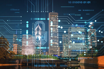 Chicago downtown area city view and Millennium Park area, night time, Illinois, USA. Skyscrapers of financial district. The concept of cyber security to protect companies confidential information