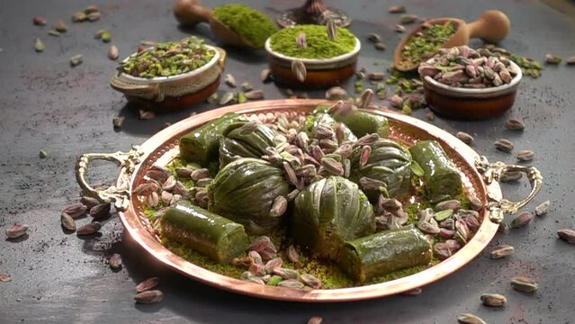 Traditional turkish baklava pistachio pastry. Dilberdudagi, ozel kesim baklava, cikolatali baklava, fistikli baklava, katmer, fistikli kadayif, kattafi, fistik sarma, soguk baklava, midye baklava, cev