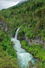 Fototapeta na wymiar Travel destination Norway - Waterfall - Jostedalsbreen National Park