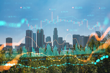 Obraz na płótnie Canvas Los Angeles panorama skyline of downtown at day time, California, USA. Skyscrapers of LA city. Glowing forex graph hologram. The concept of internet trading, brokerage and fundamental analysis